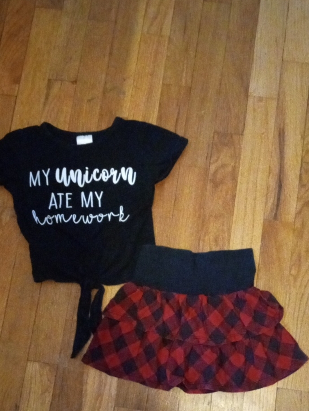 Black 'My Unicorn Ate My Homework' Top and Red Plaid Ruffle Skirt girl  6